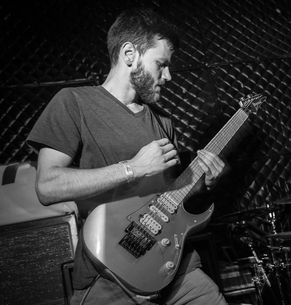 Zack Morgenthaler playing guitar.